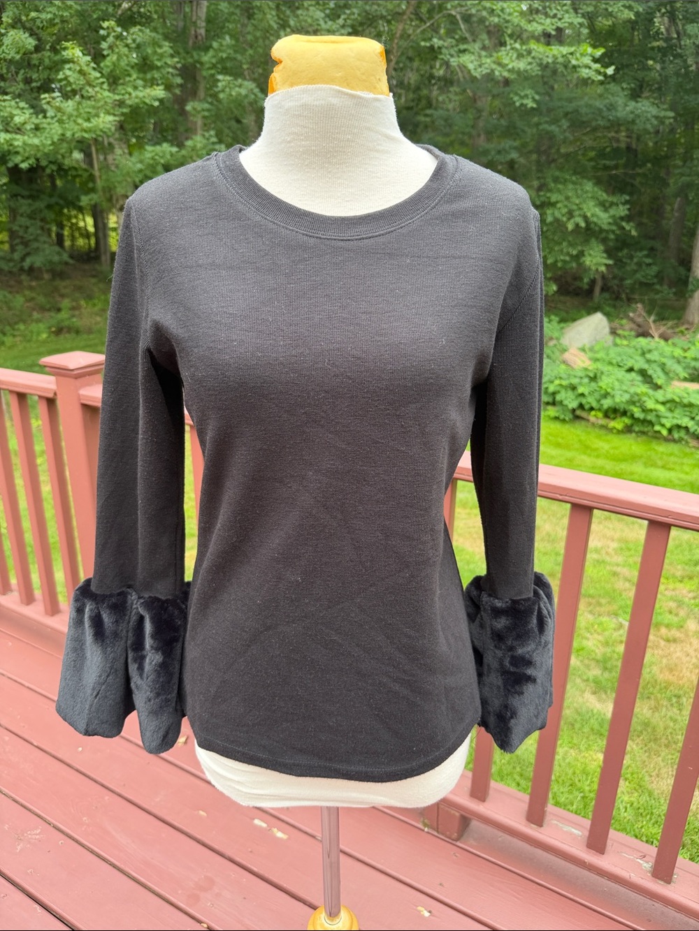 Beulah black medium faux fur sleeve top.